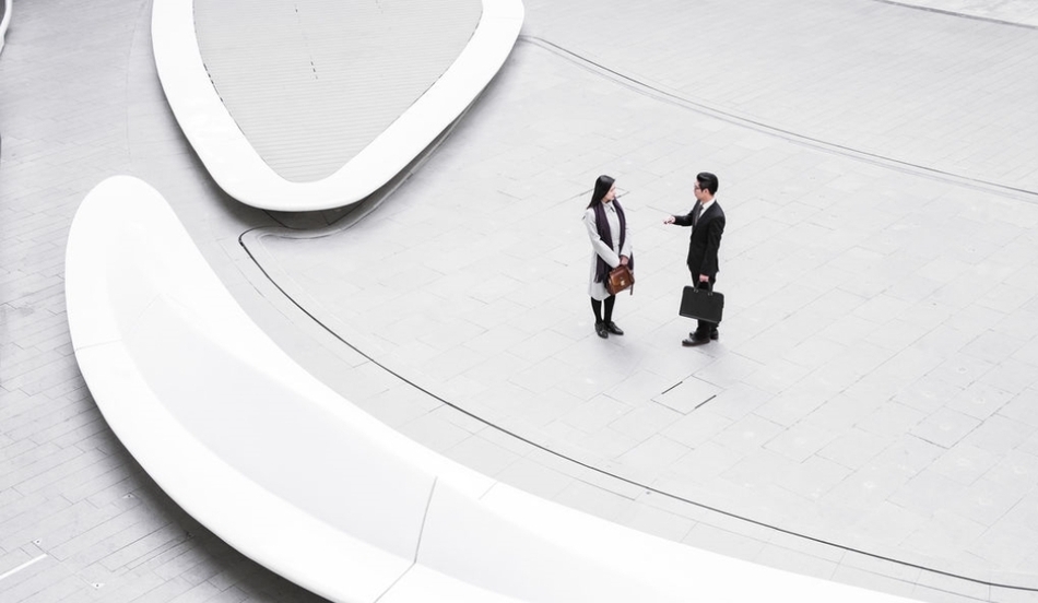 Two people talking overhead